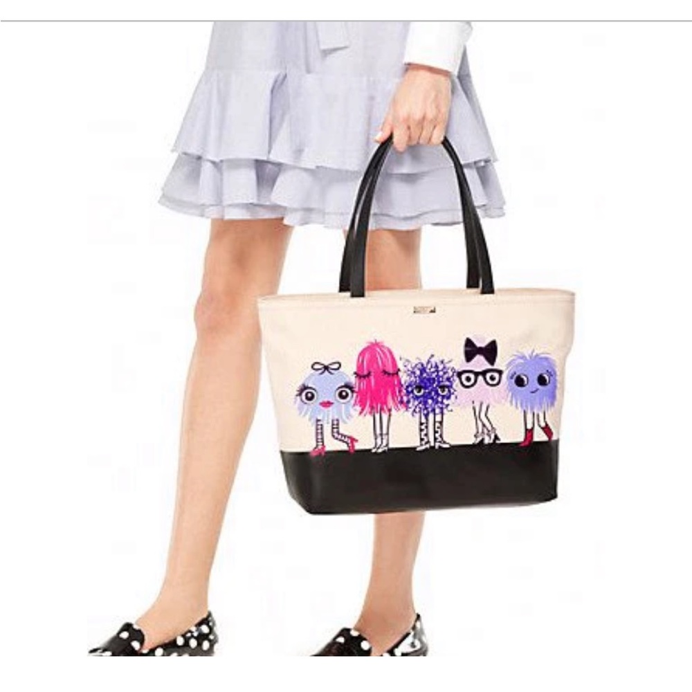 Kate Spade monster tote and wallet in great condition.
